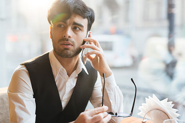 A Man handling customer service calls